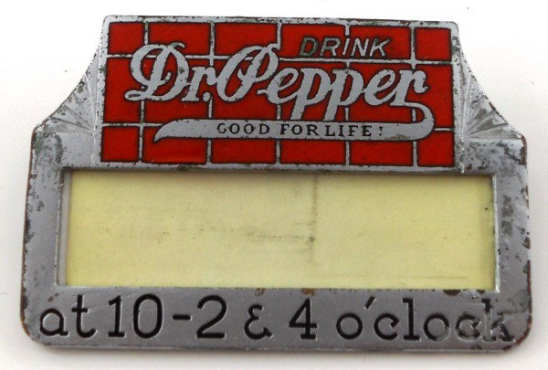 Dr. Pepper Name Badge: This is a 1930s name badge made for Dr. Pepper by Stellmacher & Clark Inc., Dallas. The red is enameled & the base metal seems to be nickel plated brass as it is non-magnetic. A must for a Dr. Pepper 