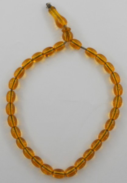 Vintage Middle Eastern Amber prayer beads: Vintage Prayer Beads 9" long 31 beads 29 are the same size.