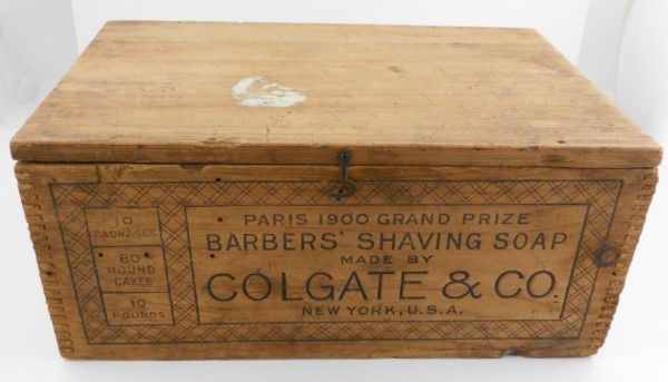 Colgate Barber Shaving Soap Shipping Box: For Auction is an old Colgate Shaving Soap Box. It has a hinged lid with finger joints holding it together at the corners. It says on the long sides "Paris 1900 Grand Prize Barbers' Shaving Soap Made