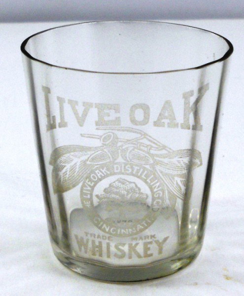 Etched Whiskey Glass - Live Oak - Cincinnati, Ohio: Pre-Prohibition era etched glass advertising "Live Oak Whiskey" from The Live Oak Distilling Co. Cincinnati, Ohio. They were in business under this name from 1902-1910. This is a Thin-walled shot glas