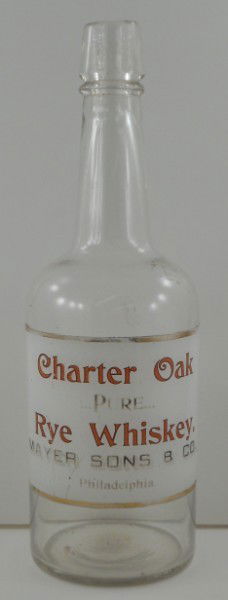 Charter Oak Whiskey Enamel Labeled Back Bar Bottle: This is a back bar bottle for Charter Oak Pure Rye Whiskey. It was from Mayer & Sons Company of Philadelphia. The Label is hand-applied enamel and has a white background with red and black lettering a