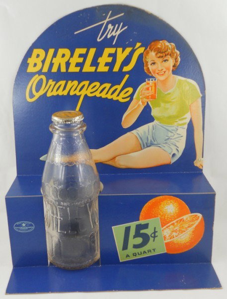 Birely's Bottle Display: Circa 1935 Birely's Bottle Display with bottle and cap. This display is in excellent condition, with the exception of some color loss at the very top and top-right. The rest of the colors are very bri