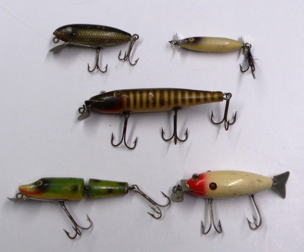 5 Vintage Wooden Fishing Lures: This auction is for a lot of five different vintage wooden fishing lures. These are from C.C.B. Co., Paw Paw and a couple unmarked ones. The mostly green jointed one is from Paw Paw and we believe the