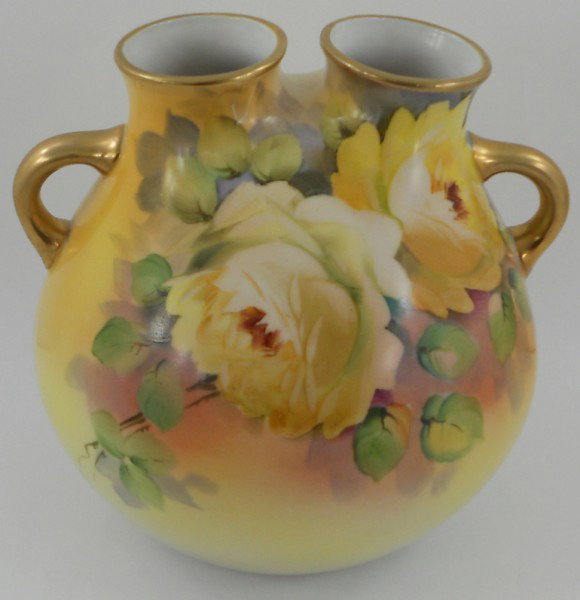 Unique Nippon Green Mark Hand Painted Vase: Offered here is a wonderful Morimura green wreath mark Nippon handles vase or urn. It features a Floral Design with Gold Handles and openings. This vase is rather unique with the two openings as we we