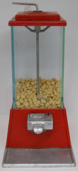 Vintage Star Candy Dispenser: This is a vintage Star Candy Dispenser from the 1950's. The machine can vend either candy or peanuts. The one cent coin operated mechanism is clean and free of scratches on the metal and glass. It has