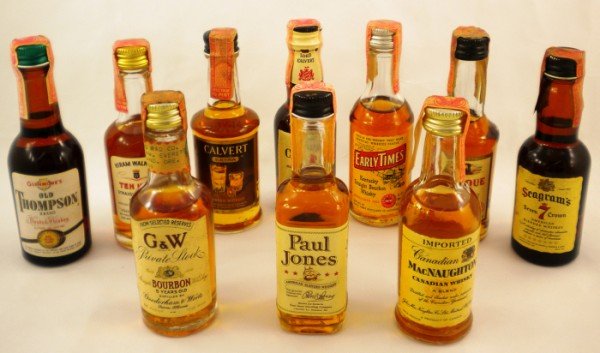 Vintage Mini Whiskey Bottles: This Collection is part of an Estate and has been stored in boxes for years. All ten [10] bottles have original contents, tax stamps and/or seals. These all look to be from the 1940's through the 1970