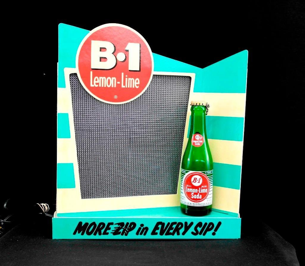 B 1 Lemon Lime Soda Light Motion Display Sign: This is a vintage counter-top display sign; it could also be mounted or hung on a wall so it was very versatile. The sign features six colored lights that flash on and off at random to draw your atten