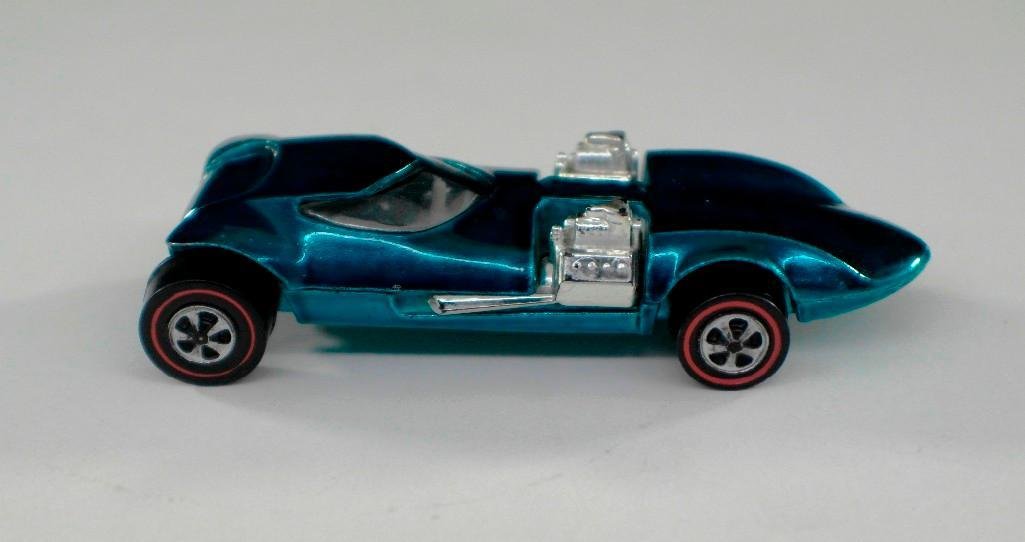 Vintage 1969 Redline Hot Wheels - Twinmill - Aqua: This vintage redline Hot Wheel toy car is the Twinmill. It is model #6258 and was issued from 1969-1971. The car is aqua with a white interior and was made in the United States. It is as nice as they 
