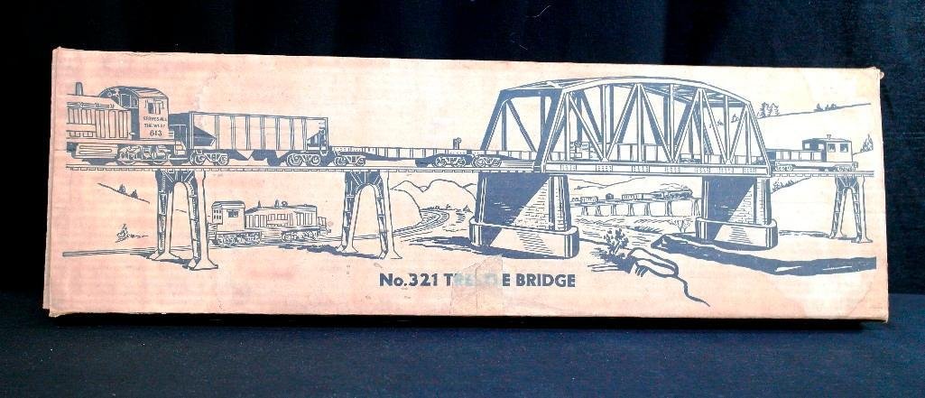 Lionel Trains no. 321 - Trestle Bridge - O-Gauge -: This Lionel Trains piece is no. 321 - Trestle Bridge. It is an O-gauge piece and comes with the original box and instructions. The piece itself is gray/silver plastic and is in very good condition, Th