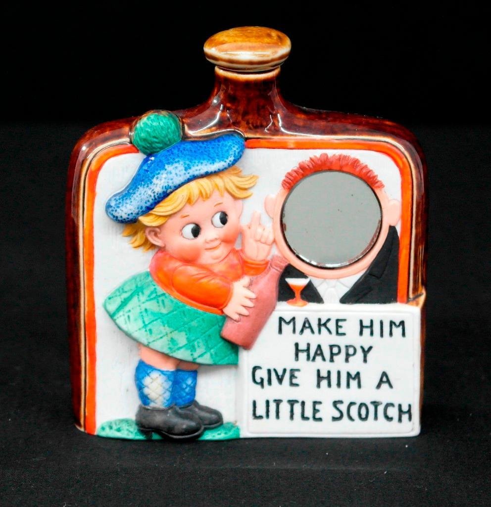 Vintage Schafer and Vater Mirror Hip Flask - "Give Him: This vintage Schafer and Vaterhip flask is unique in that it also features a mirror. The flask reads "Make Him Happy Give Him A Little Scotch" and has a young child holding a bottle of scotch towards