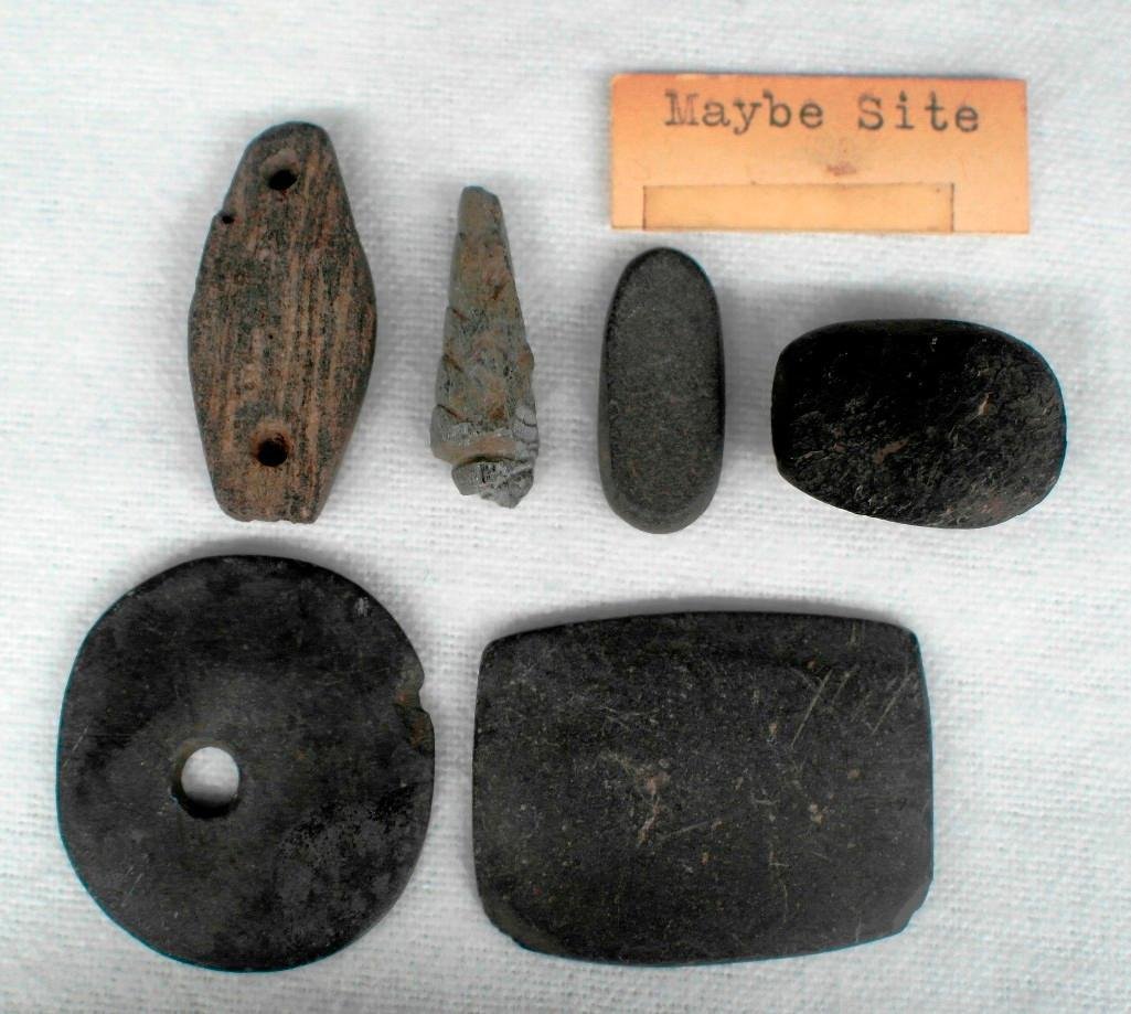6 Stone Artifacts or Beads - Maybe Site - Columbia: This lot features a six stone items or beads. These were all found circa 1960 at the Maybe Site on the Columbia River. It is a well-known Late Archaic to Paleo site that produced many points and tools