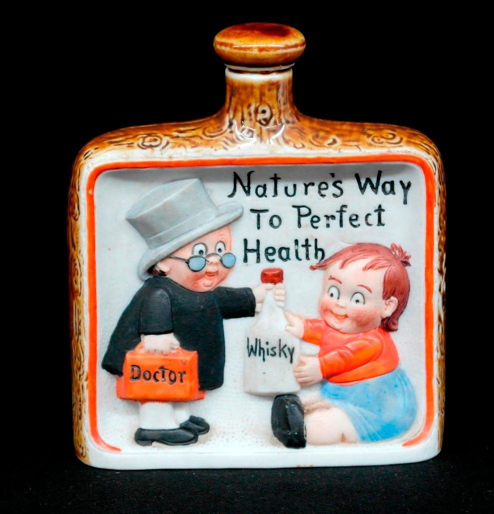 Vintage Schafer and Vater Color Hip Flask - "Nature's: This vintage Schafer and Vaterhip flask is titled "Nature's Way to Perfect Health" and depicts a doctor handing a bottle of whisky to a small child. The flask is in very good condition with no chips o