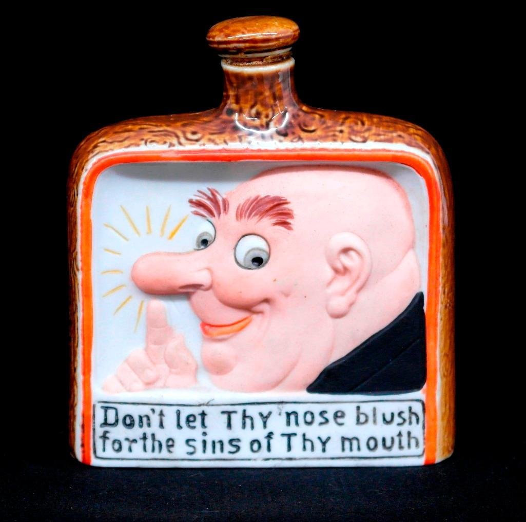 Vintage Schafer and Vater Color Hip Flask - "Sins of: This vintage Schafer & Vaterpiece is a color hip flask titled "Don't let thy nose blush for the sins of thy mouth." The flask features a bald man pointing to his nose, which usually appears to be a da