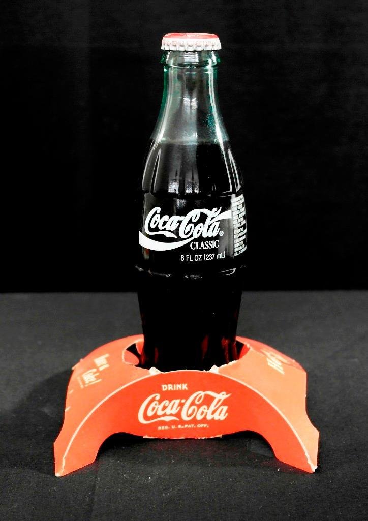Vintage 1950s Die Cut Coca-Cola Cardboard Bottle: This vintage 1950s piece of advertising concerns Coca-Cola and is a die cut cardboard bottle counter display stand. It measures 5" x 5-1/2" when assembled and was manufactured by Point of Purchase Dis