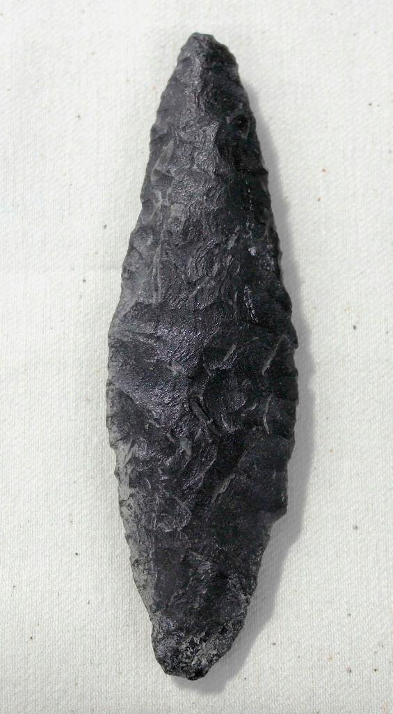 Large Obsidian Knife from Fort Rock, Oregon: This artifact or point was found by Frank Buehler, founding member of the Oregon Archaeological Society (OAS). His artifacts were found from the 1930s through the 1960s at OAS dig sites in the region.