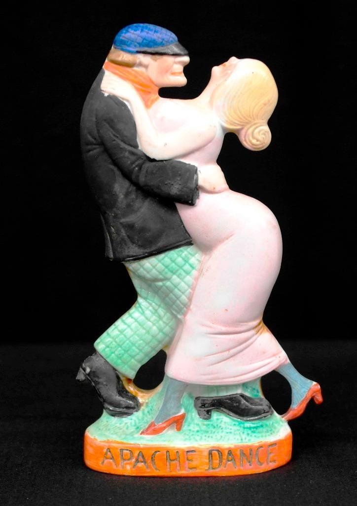 Apache Dance Schafer & Vater Colored Nipper Dance Flask: This Schafer & Vater piece is a colored nipper flask in the dancers style. It is titled, "Apache Dance," and features a real hip looking man and a woman dancing. This piece comes complete with the ori