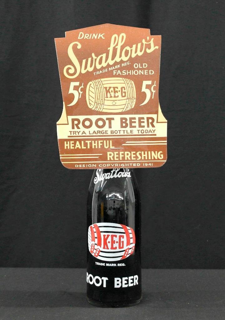 Vintage 1941 Swallow's Old Fashioned Root Beer Bottle: Swallow's Root Beer was bottled by the Cleo Cola Company of Muncie, Indiana. This vintage bottle topper is new "old stock," and is approximately 5 inches x 6-3/4 inches. The topper wants you to try a