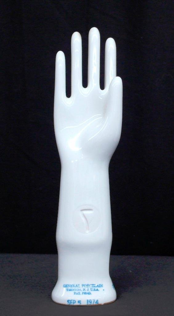 Porcelain Glove Display: This porcelain glove display was made by General Porcelain of Trenton, New Jersey, and is dated September 5, 1974 with its patent pending. It was used in stores to display gloves and measures approxim