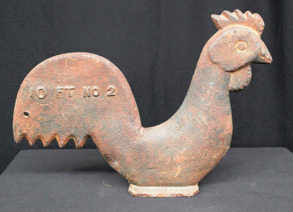 Rooster Windmill Weight: This is the first of two different windmill weights we will have in this auction. This weight is in the shape of a chicken or rooster and features five tail feathers and five peaks on its head. On one