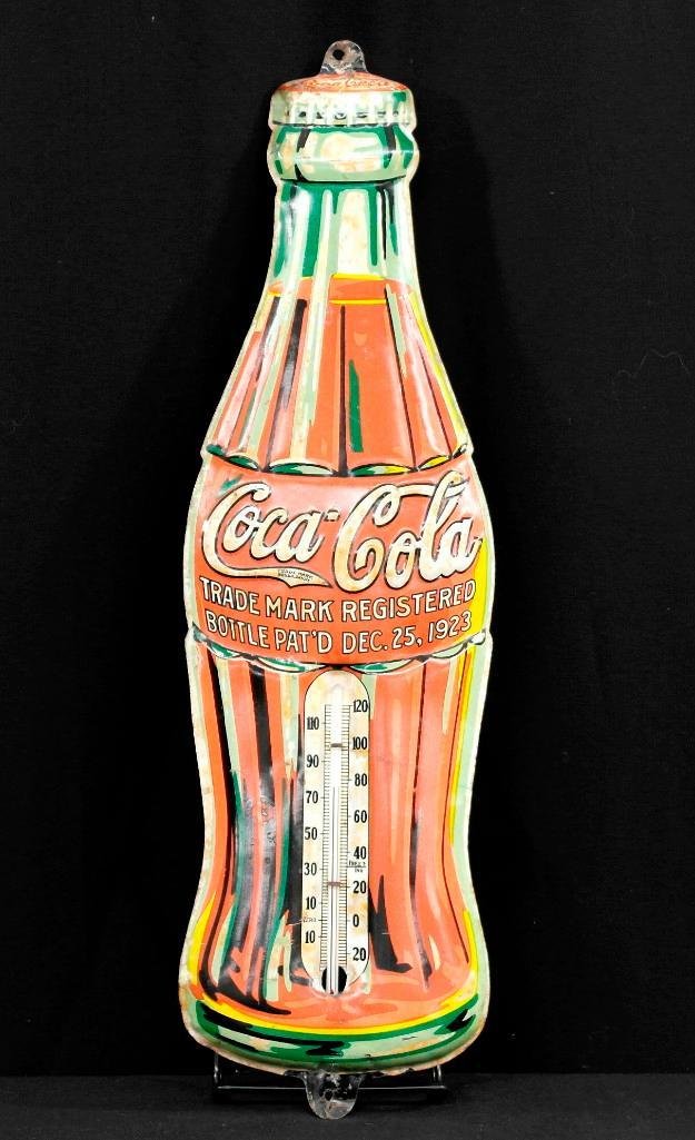 Original Coca Cola 1923 Christmas Bottle Thermometer: Offered is a die-cut embossed tin litho bottle thermometer. It features the Dec. 25, 1923 Christmas Coca Cola bottle design and was made right here in the U.S.A. There are mounting tabs on the top and