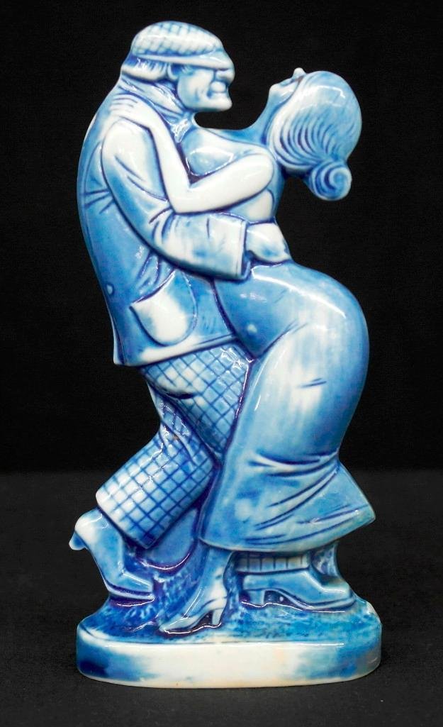 "No Words" Schafer & Vater Blue Nipper Dance Flask: This Schafer & Vater piece is a blue nipper flask in the Dancers style or theme. It is referred to as, "No Words," and is the same design and pose as the pieces titled, "Apache Dance" and "Apachentanz