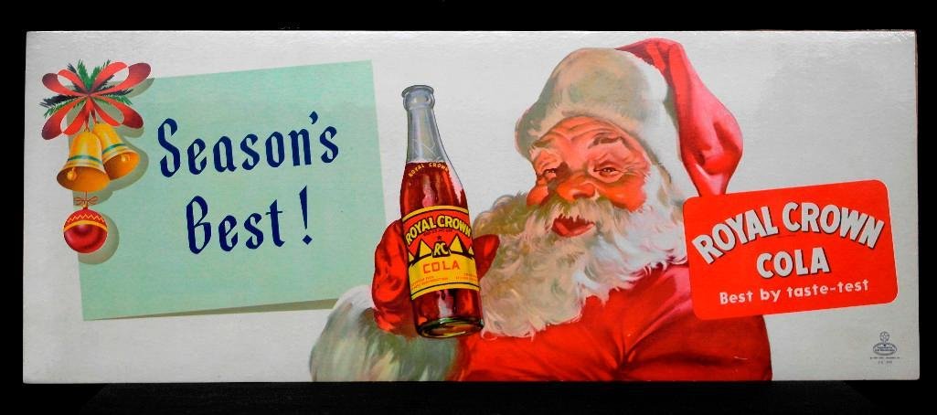 Royal Crown Cola Cardboard Bus Sign: This cardboard bus sign features Santa holding a bottle of Royal Crown Cola wishing everyone, "Season's Best." Royal Crown is a product of the Nehi Corporation of Columbus, Georgia. This sign measures