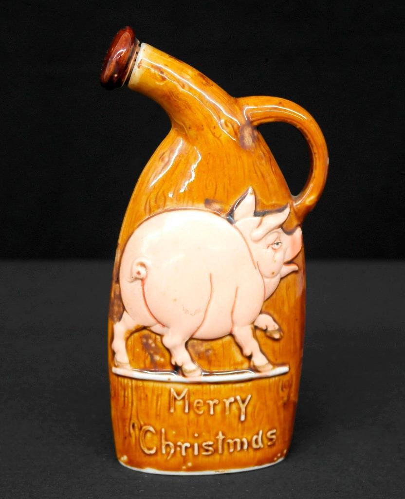 Schafer & Vater Cannon Flask Merry Christmas - Pig: This Schafer & Vater cannon flask depicts a pig walking and perhaps saying Merry Christmas. There is the inscription near the bottom Merry Christmas and is referred to as Merry Christmas - Pig. These