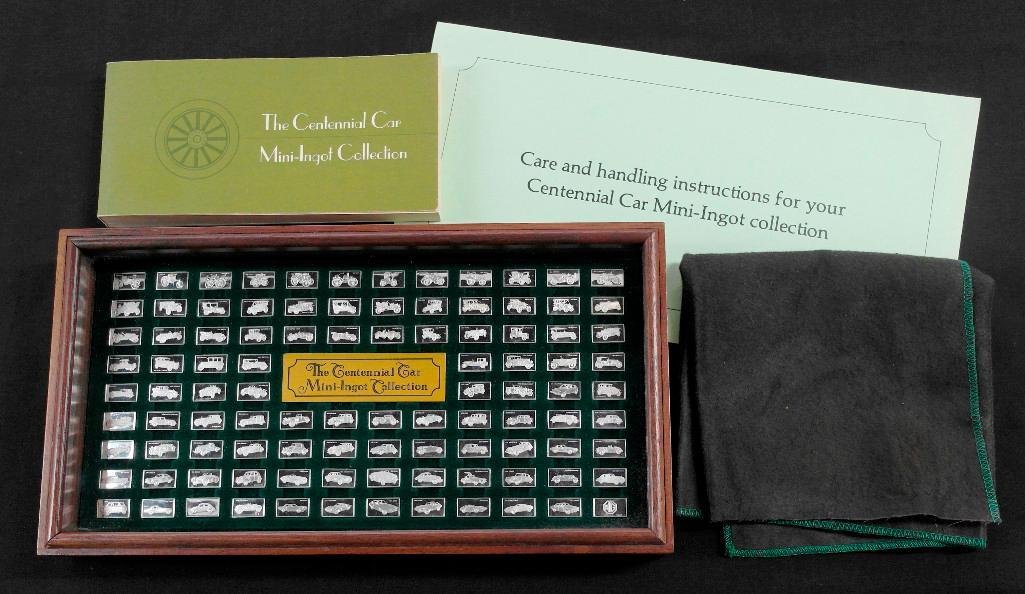Sterling Silver 100-Piecec Mini-Ingot Car Collection: This lot is for "The Centennial Car, Mini Ingot Collection" which includes a display case, handling instructions, and booklet. The set was made by the Franklin Mint in 1975 and features 100 different