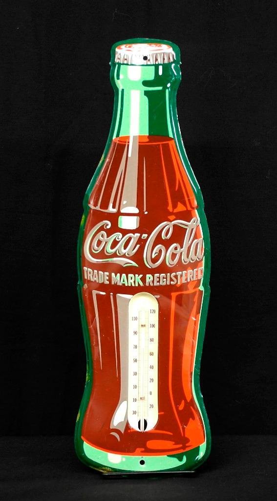 Coca - Cola Bottle Thermometer: This is an original Coca-Cola Thermometer. It is the flat bottle design that uses the hobble skirt bottle and is circa 1950. It keeps accurate temperature and has seen a little use. There is some army