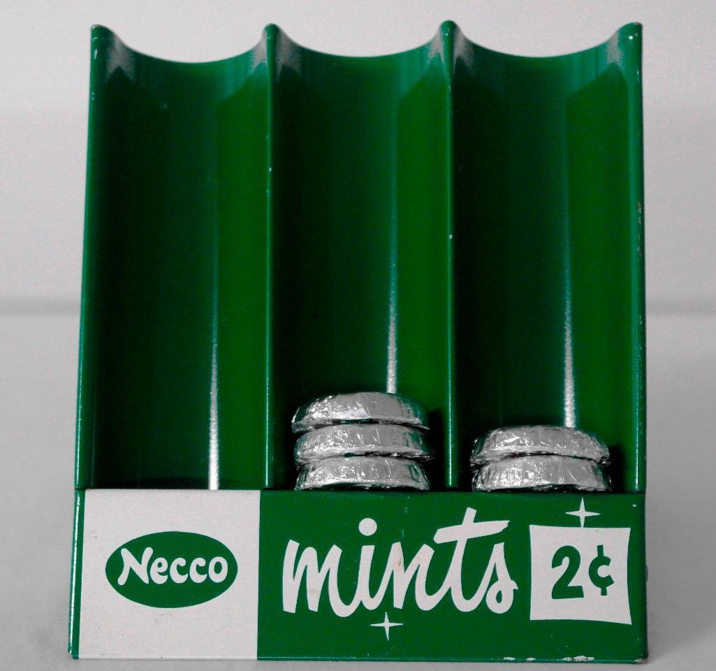 Necco Mints Counter Display: This tin-litho display was usually placed near the cash register at restaurants for impulse purchases of after dinner mints. The display was made by Richard A. Kline, Inc. in Norwood, Massachuset