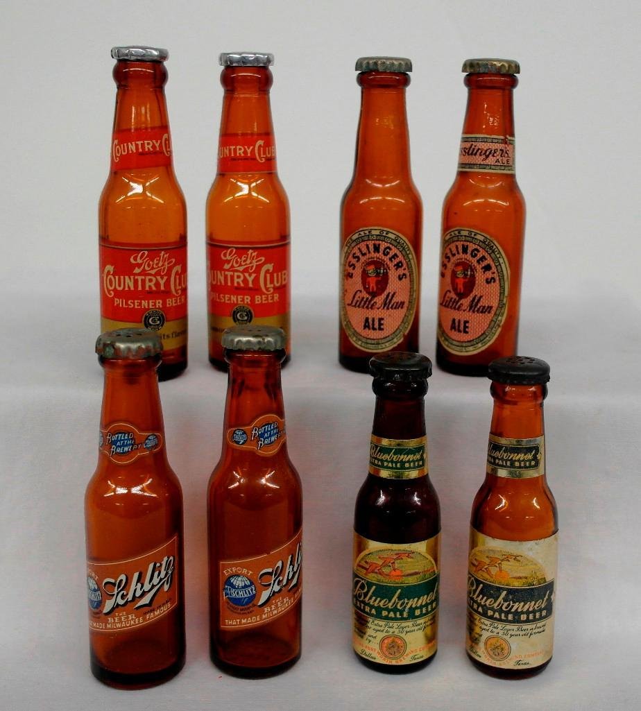 Four (4) Pairs of Mini Bottle Salt and Pepper Shakers: These salt and pepper shakers are for different beers: Schiltz Beer, Goetz Country Club Pilsener Beer, Bluebonnet Extra Pale Beer, and Esslinger's Little Man Ale. All four pairs of mini bottles have&n