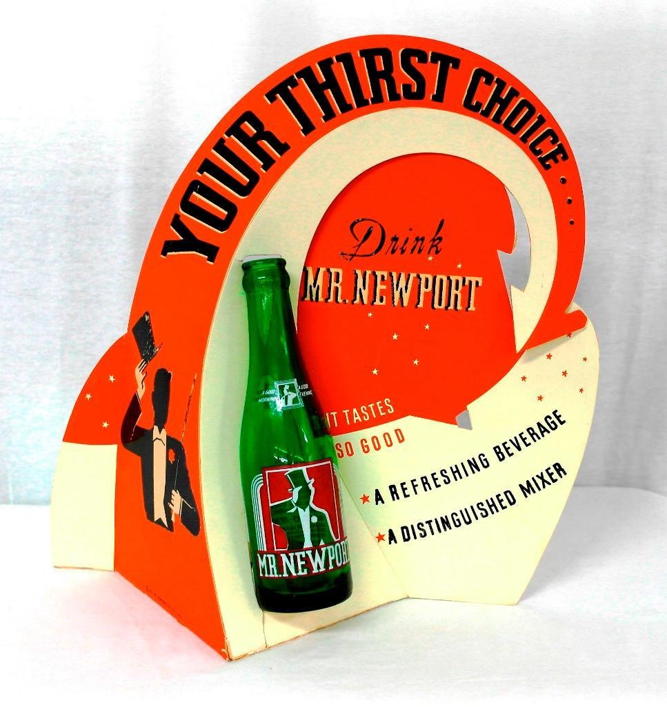 Mr. Newport Bottle Display With Bottle: This display was manufactured by Adams Manufacturing Co of Chicago, Illinois in 1941 for Mr. Newport, Inc. of Chicago. This very colorful display comes with the right bottle which is NOT very easy to 