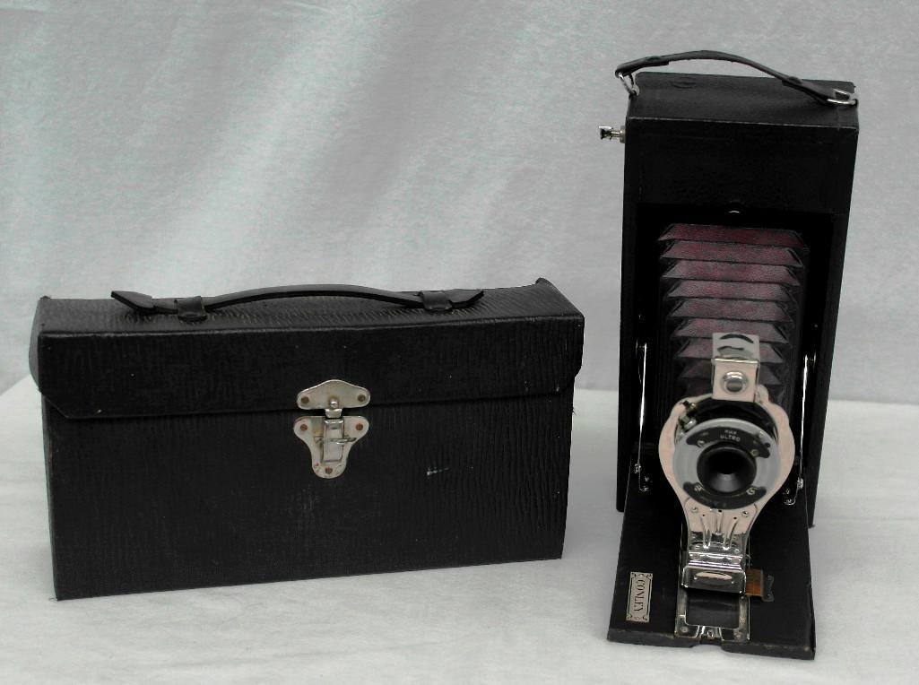 Vintage Conley Folding Camera With Red Bellows: The Conley Camera Company of Rochester, Minnesota manufactured cameras from 1898 to 1926. This Conley Junior Camera appears to be one designed as the first roll camera for Sears, Roebuck & C
