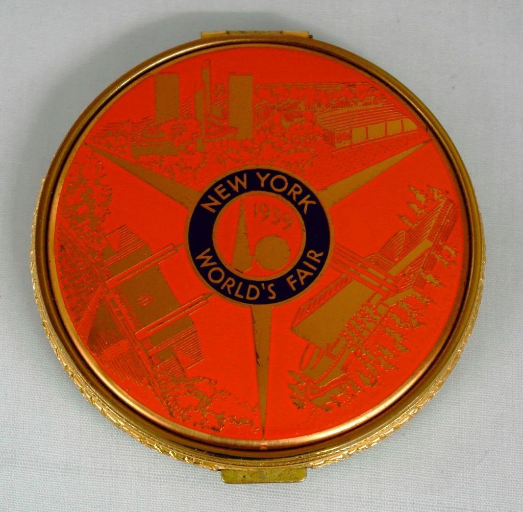 New York World's Fair Ladies Compact: The only flaw I can find on this beautiful compact is a few dots on the mirror. It is 2-1/2" in diameter and is truly something you need to see and hold to appreciate.