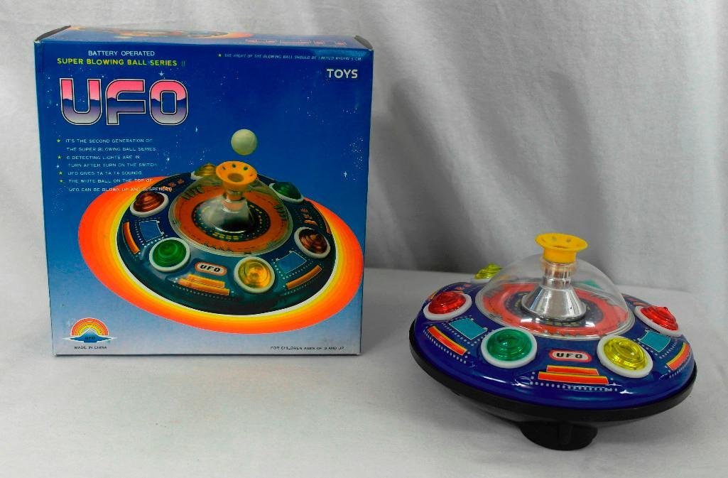 UFO Tin Litho Toy - Super Blowing Ball Series II: This fabulous UFO tin litho toy is from the Super Blowing Ball Series II. Made in China, the battery-operated toy has never been used except when we tested it to make sure it works.....it works great!
