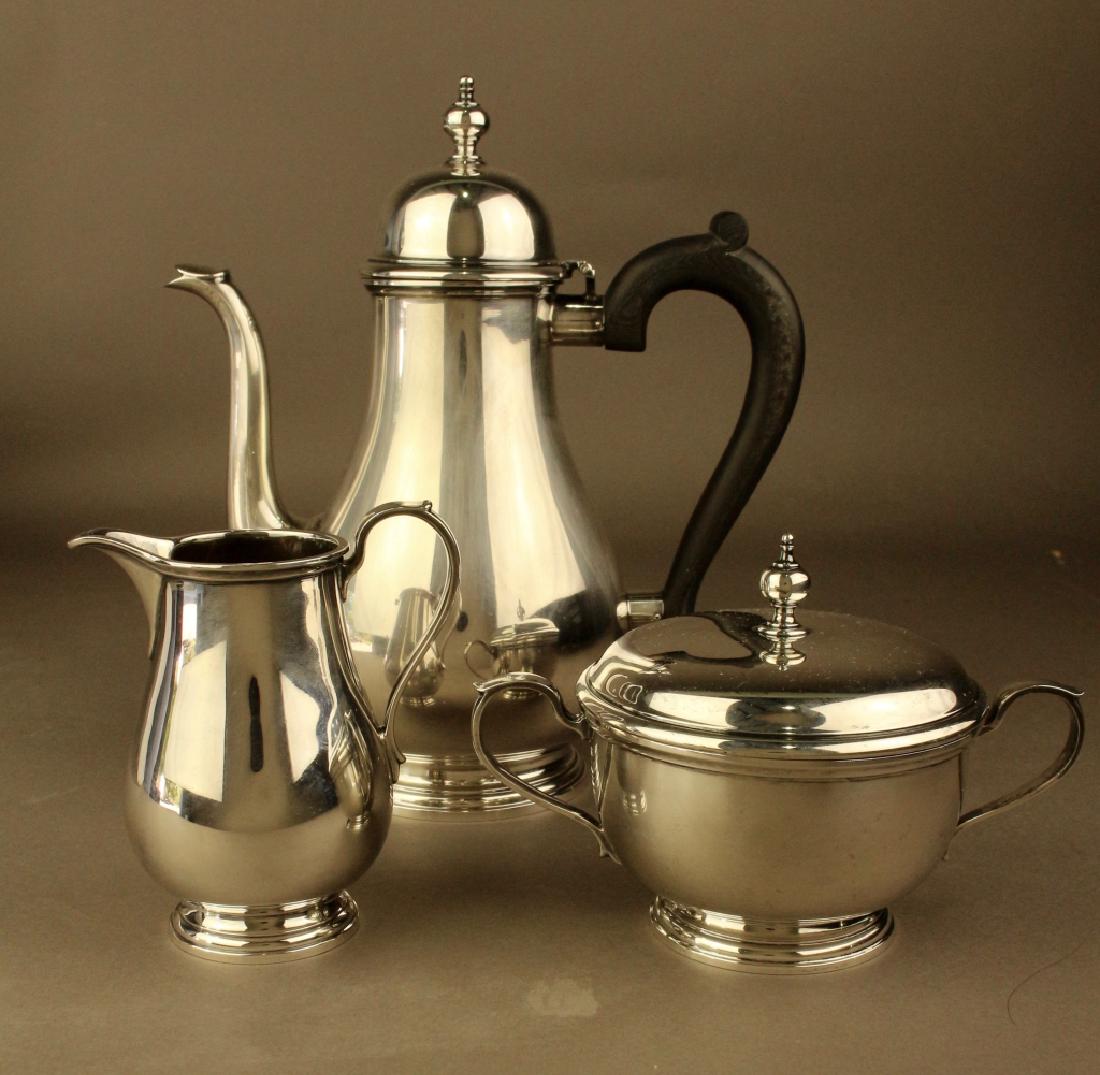 Tiffany & Company Sterling Silver Tea Set: Tiffany & Company sterling silver 3 piece tea set, Queen Anne pattern, 22555 "L", good condition with one minor ding on tea pot body. 40 ozt.