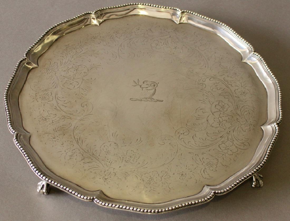 Georgian Chippendale Sterling Salver: Fine Georgian Chippendale sterling silver salver, c. 1777, Robert Makepeace and Richard Carter, Silversmiths. 14" diameter, 1.5" high on ball and claw feet, beaded rim, etched floral and leaf interior