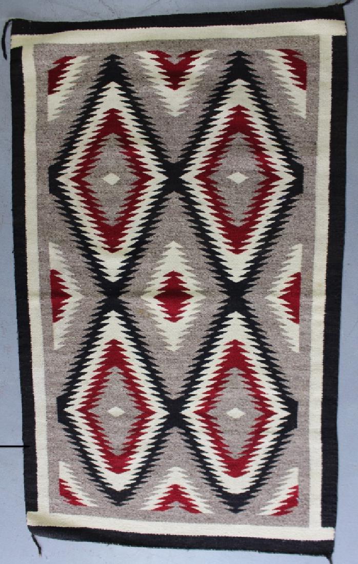 Woven Navajo Blanket: Woven Navajo blanket in excellent condition, 34.5" x 52", black, reds and natural colors, c. 1930s, from local collection.