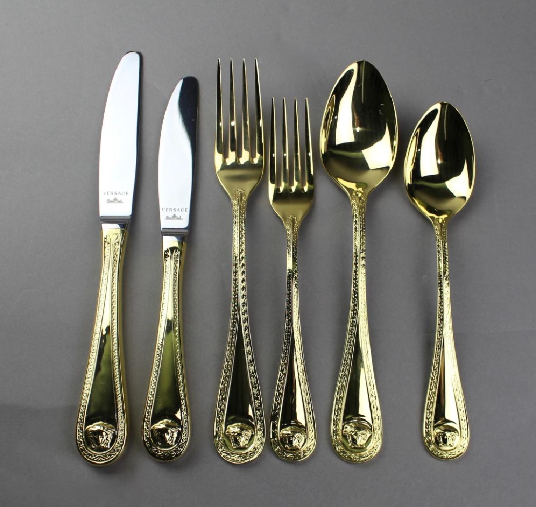 Versace Gold Flatware "Medusa": Versace by Rosenthal gold flatware "Medusa" pattern, 36 pieces includes, 6-DK, 6-DF, 6-LF, 6-LK, 6-DS, 6-TS. All in like new condition.