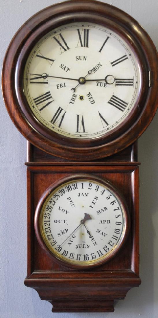 E. N. Welch Spring & Co. #4 Calendar Clock: E. N. Welch Spring & Co. #4 perpetual calendar wall clock rosewood case, clock face with Roman numerals and days of the week, bottom face with dates, spring driven time and strike, B.B. Lewis perpetua