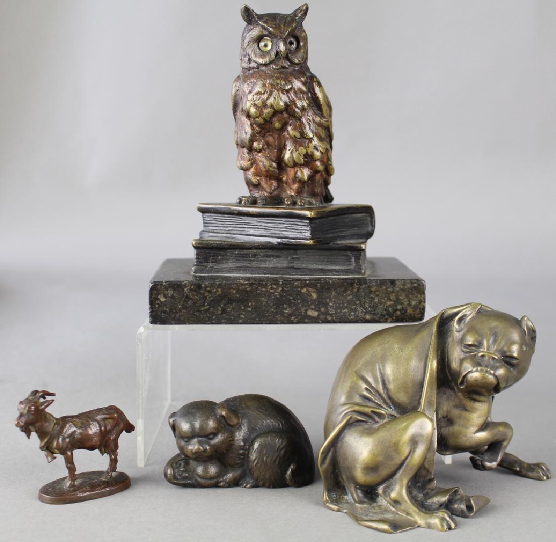 Group of Four Miniature Bronzes: Group of four miniature cabinet bronzes: 2.75" dog curled up with ball, signed Tiffany Studios, New York. 2.5" Billy goat with bell signed Theodore B. Starr Inc. New York. A cowling pit bull 4.5" x 3"