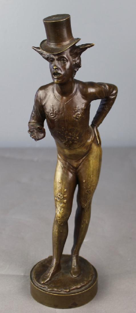 Bronze Figure of Jester: Bronze figure of Jester, dressed in leotards with top hat posing forward. Signed "Hans Late Rom.85", but unintelligible. Great patina and condition, c. 1900-10. 13".