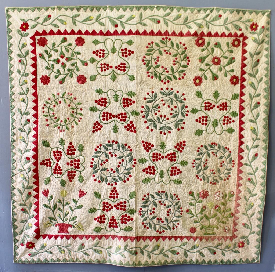 1800s Handmade Floral Applique Quilt: 1800s handmade floral applique quilt, in red and greens, 85" x 85", one area of damaged fabric (shown). Various patterns of berries and wreaths with sawtooth and vine border.