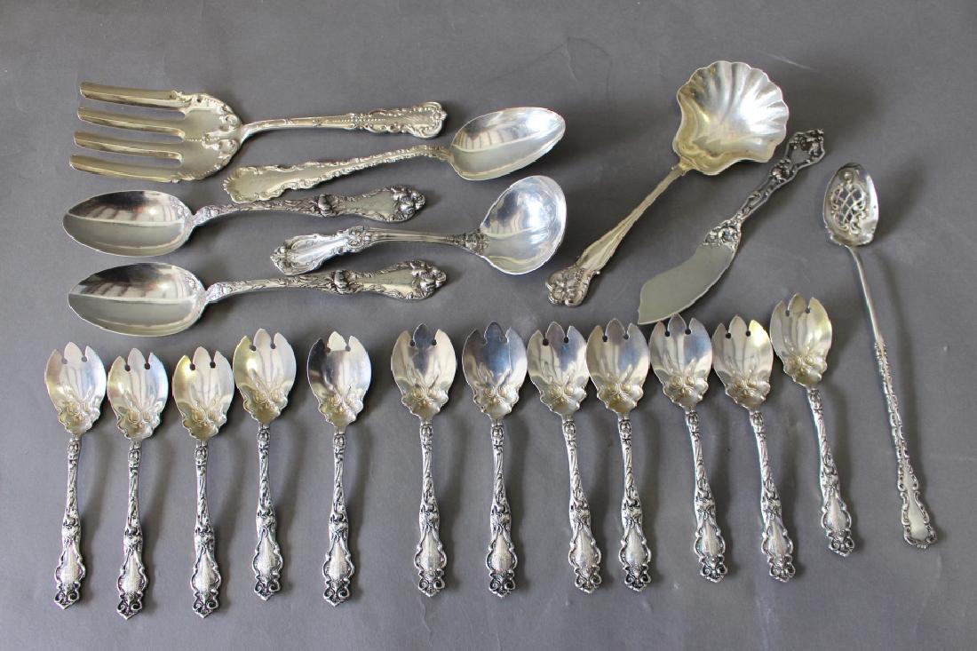 Group of Sterling Silver Flatware: Group of misc. sterling silver flatware: Durgin "New Vintage" ladle, 12 Wallace "Eton" dessert spoons, Reed & Barton "Burgundy" ladle, 2 large Reed and Barton "Intaglio" serving spoons, Whiting "Louis