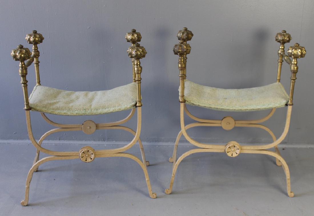 Pair Wrought Iron Campaign Chairs: Pair of wrought iron and brass folding campaign chairs, each with upholstered seat (good sturdy condition) and ornate brass clad armrests topped by puffy brass caps, all in good condition, 33" x 28" x
