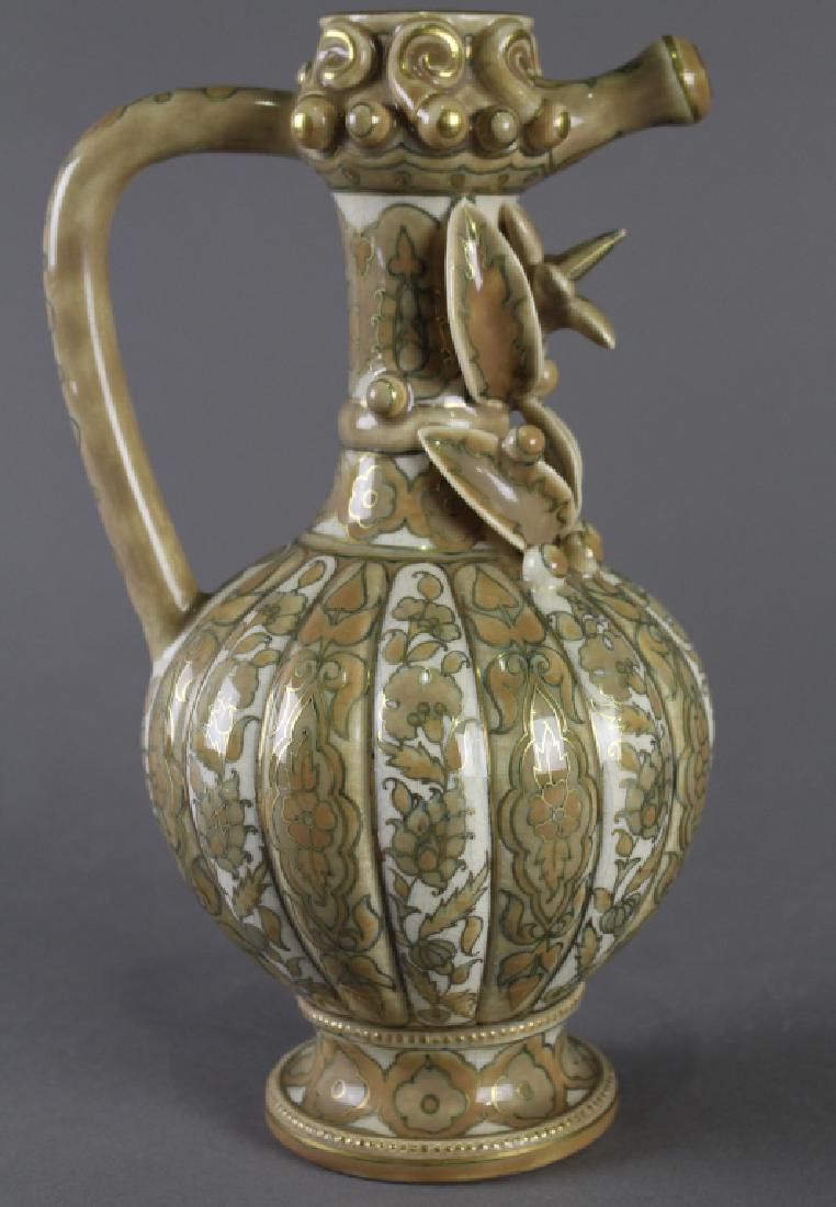 Zsolnay Pecs, Hungary, Ewer: Zsolnay Pecs, Hungary, elaborately decorated ewer, 10" x 6", gold traced florals on lobed body, applied super floral decoration, good condition.