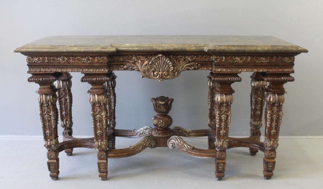 Imported Continental Console Table: Imported Continental faux marble top console table, eight richly carved legs supported by curved stretchers with center pediment, the faux marble top is parquetry inlaid and beveled, well constructed 