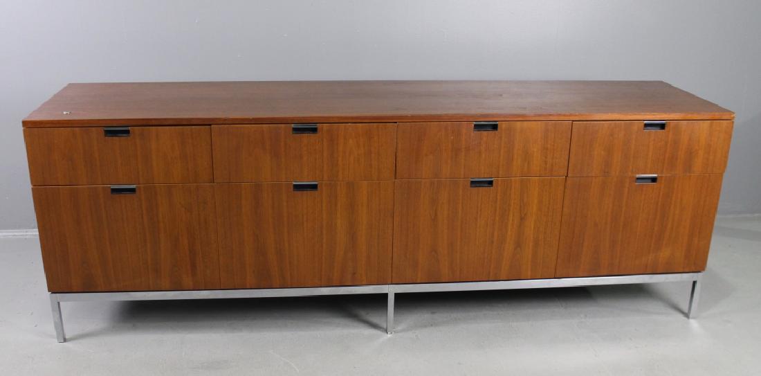 Florence Knoll Credenza: Florence Knoll 8-drawer credenza in walnut, oak drawers, chrome base and legs, locking drawers with key, some nicks to edges consistent with use, beautiful mid-century modern piece, 26"h, 74.5"w, 18"d