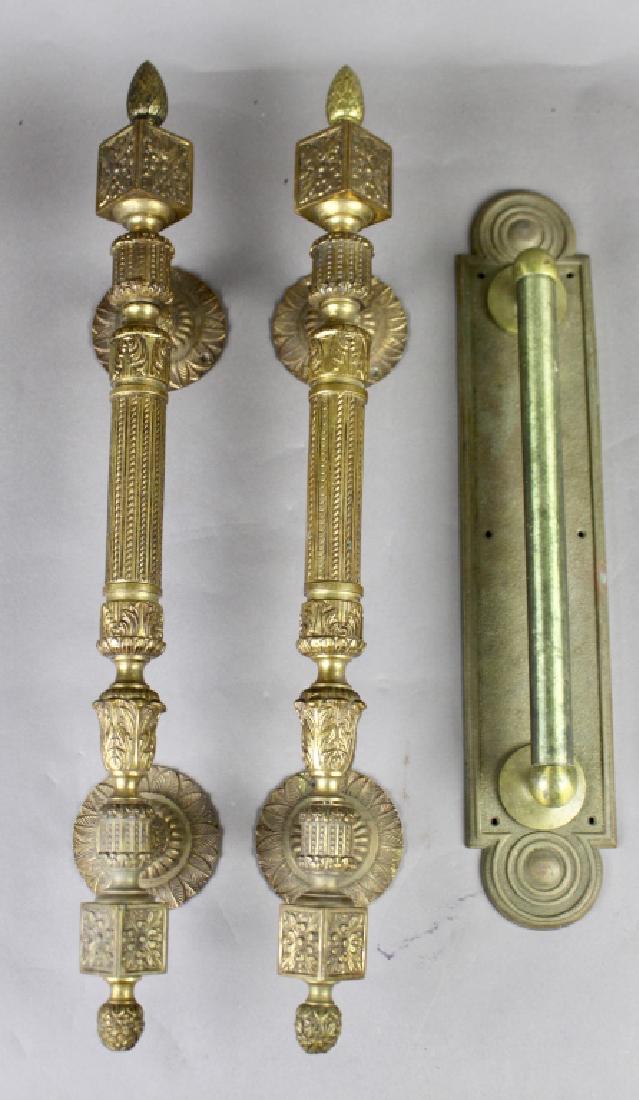 Three Large Bronze Ornate Door Handles: Three large and heavy bronze door handles: two matching ornate 24" and 20" single with back plate, all in good condition.