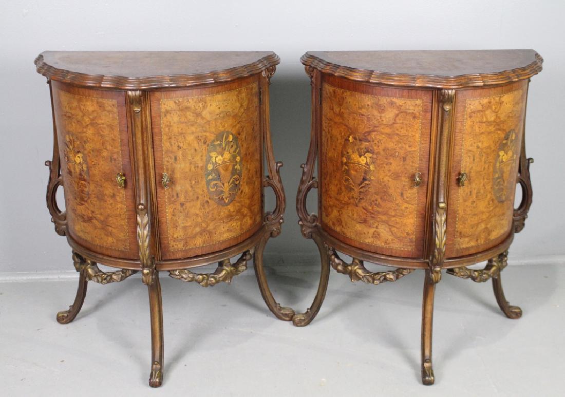 Pair Marquetry Inlay Demilune Cabinets: Pair burl wood veneer and marquetry inlay demilune side cabinets, double doors with adjustable interior shelf, pierce carved apron and backside treatments on carved cabriole legs, matched veneers with